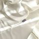 Комплект постільної білизни для новонародженого DreamLand валик молочний